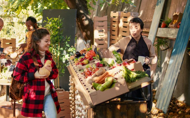 Younger woman shopping at a local farm market